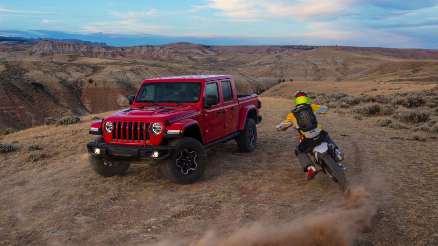 gladiator parked with dirtbike