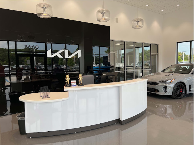 Reception desk inside the Jenkins Kia of Cocoa showroom