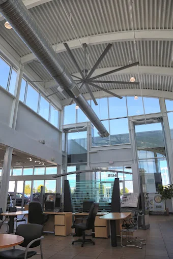 Glass atrium and sales floor inside Rizza Buick GMC